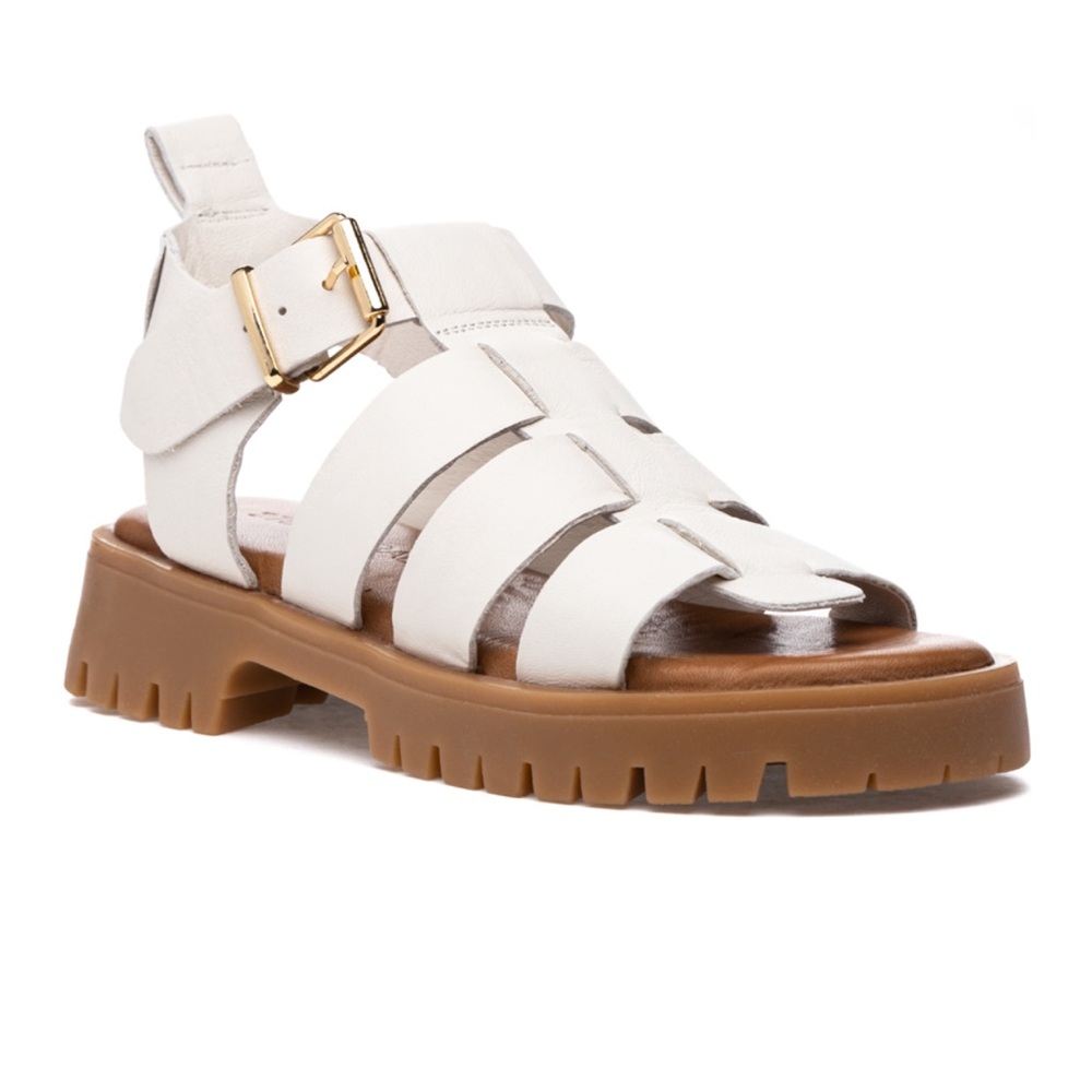 Chunky, white, huarache style buckle strap sandals by Steve Madden
